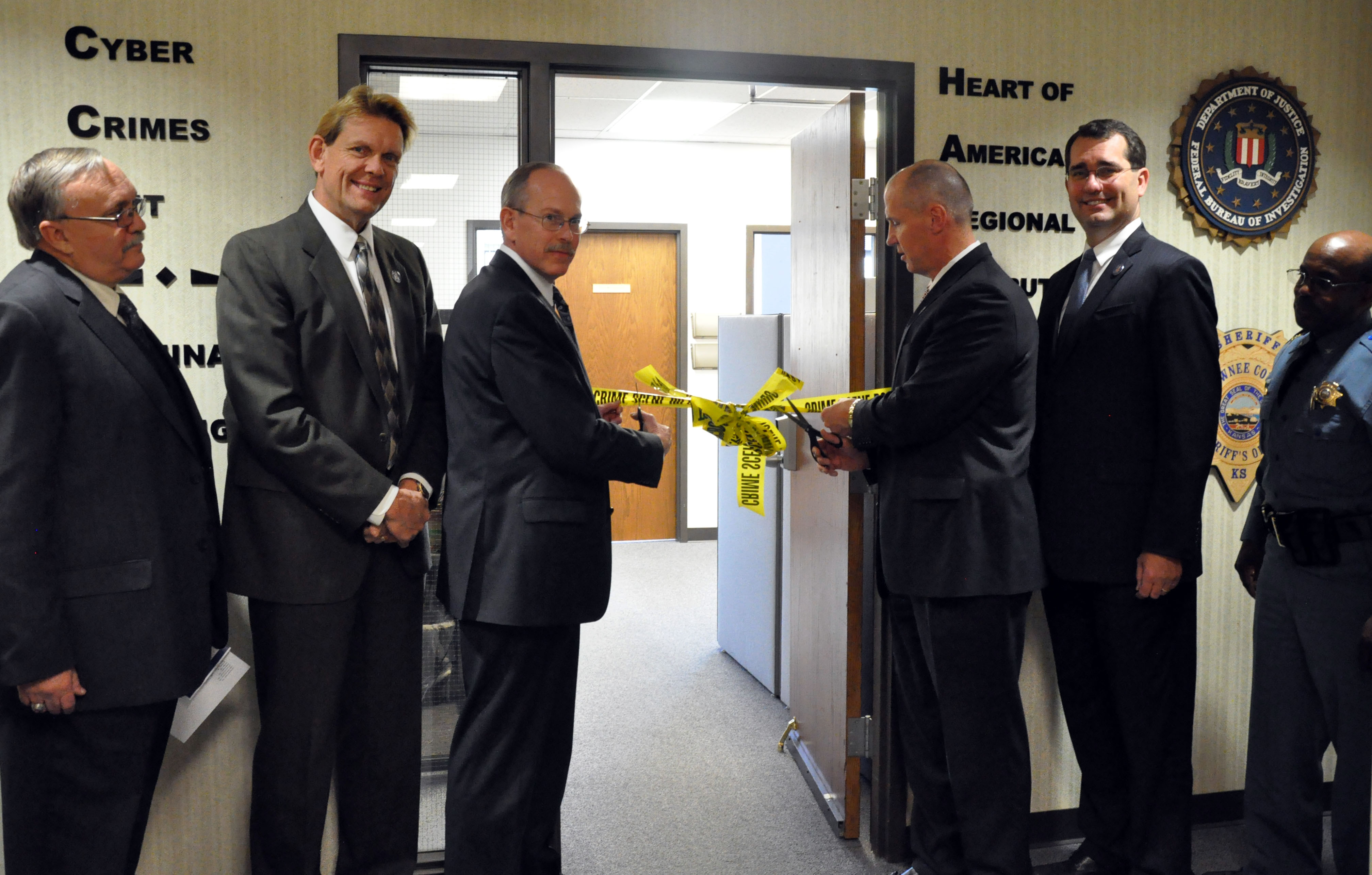 Officials cut the ribbon on the Topeka Satellite RCFL.